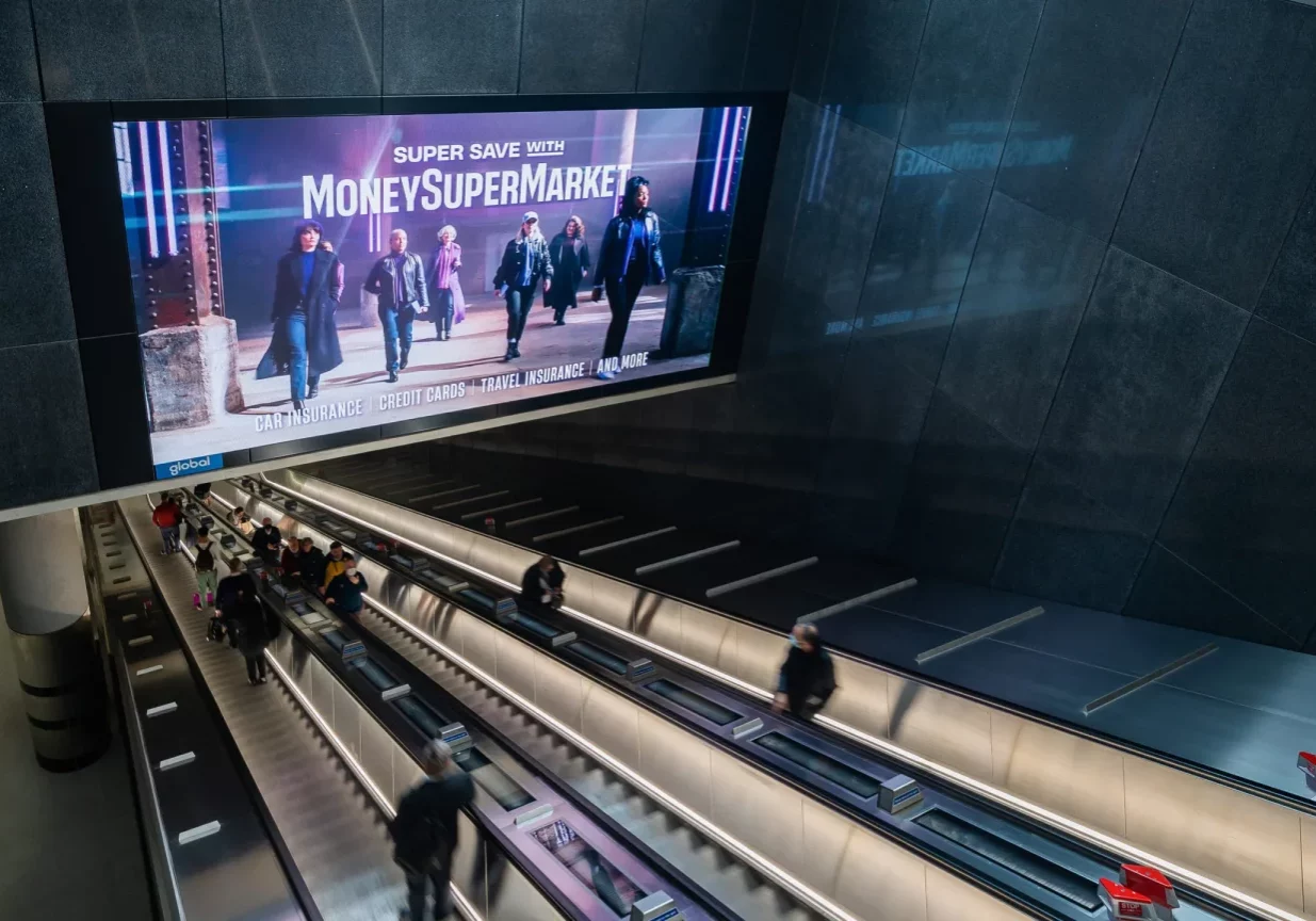 An advert for Money Supermarket on the London Underground using digital entrances.