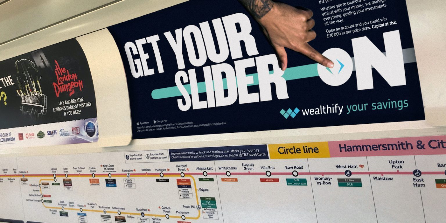 An advert for Wealthify displayed on the London Underground using Tube Car Panels.